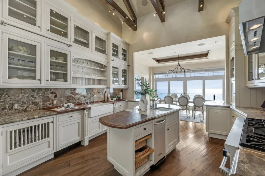 Painted kitchen cabinetry and casework brushed by hand, a beach home on the Aptos coast
